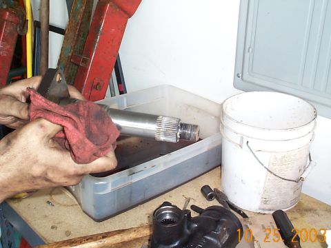 1992 Ford Bronco - After sanding the sector shaft for about 15 minutes, I used a light grade sand paper to take the scoring off of the shaft.