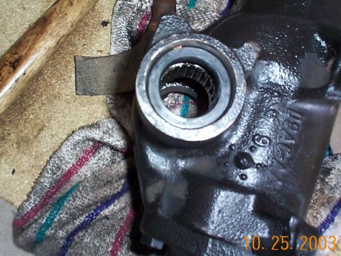 1992 Ford Bronco - Installing the new seal. Find an appropriate sized socket so you can hammer the new seal in. You want it to seat tight, this will take a li…