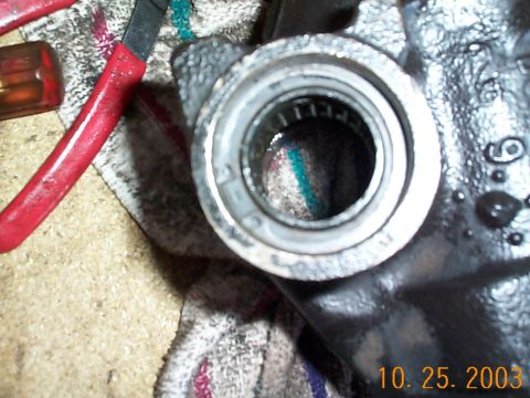 1992 Ford Bronco - The new snap ring will go right on once the seal has been seated properly. Once this is done give the sector shaft a light coat of grease a…