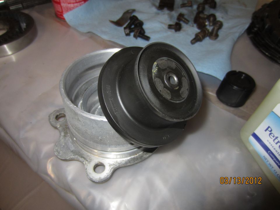 Pulley and housing assembly on a workbench