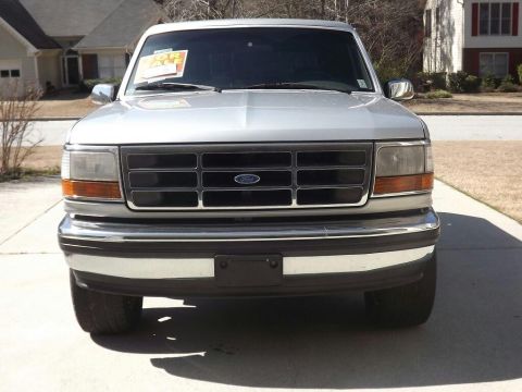 1993 Ford Bronco - Front view of a 1993 Ford Bronco parked in a driveway.