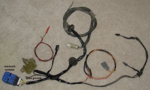 1983 Ford Bronco - A collection of automotive wiring components, including a main harness with multiple connectors and labeled sections.