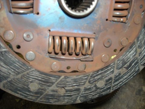 1979 Ford F-150 - Clutch pressure plate with visible springs and wear marks on the friction surface.