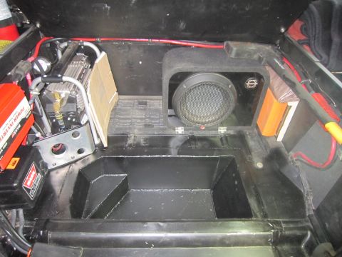 2008 Jeep Wrangler - Aftermarket modifications are visible within the vehicle's rear storage area.