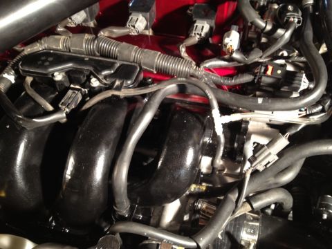 1987 Ford Bronco - Engine intake manifold and associated wiring harness components are shown in detail.