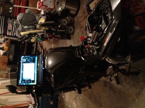 2008 Yamaha FZR1000 - A motorcycle is fitted with a computer screen, displaying what appears to be a diagnostic or tuning interface.