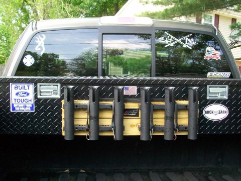 2008 Ford F-150 - This 2008 Ford F-150 features a custom diamond plate toolbox with an integrated fishing rod holder system.