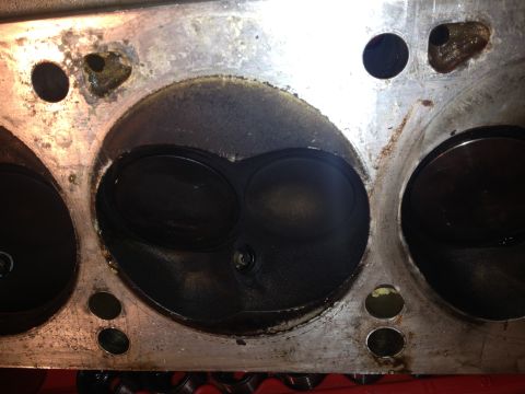 1992 Ford Bronco - This image shows a close-up view of an engine's cylinder head, highlighting the valves and combustion chambers.