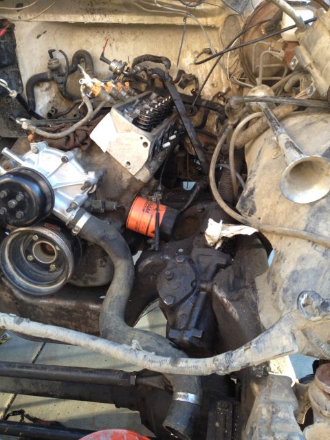 1992 Ford Bronco - Engine bay during a motor rebuild, with parts disassembled for access.