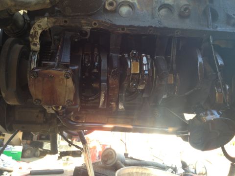 1992 Ford Bronco - Close-up view of the internal engine components, showing the crankshaft and connecting rods.