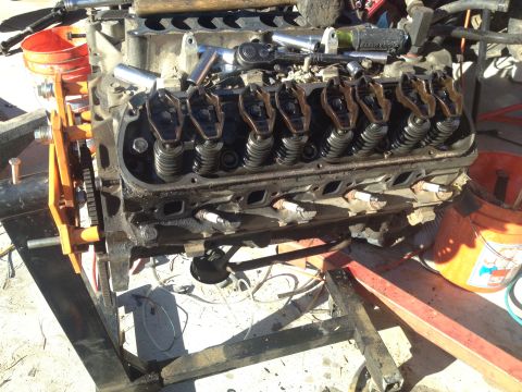 1992 Ford Bronco - The engine's valve train is exposed, with rocker arms and springs visible.