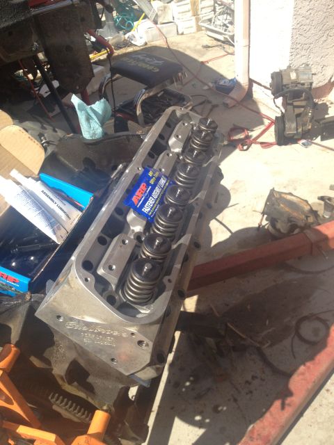 1992 Ford Bronco - Engine cylinder head assembly with ARP fasteners and springs, likely for a rebuild project.