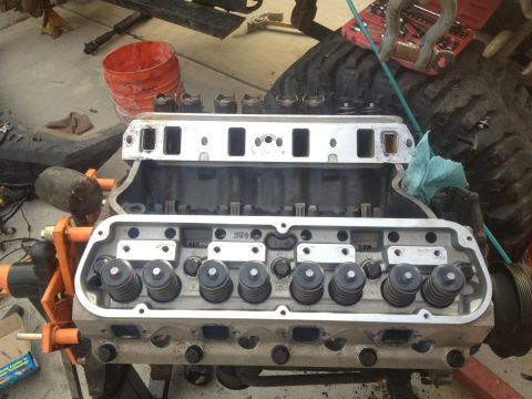 1992 Ford Bronco - Engine block and cylinder heads are visible, suggesting a motor rebuild is in progress.