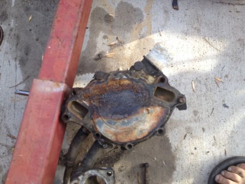 1992 Ford Bronco - This is a used car water pump, showing signs of corrosion and wear.