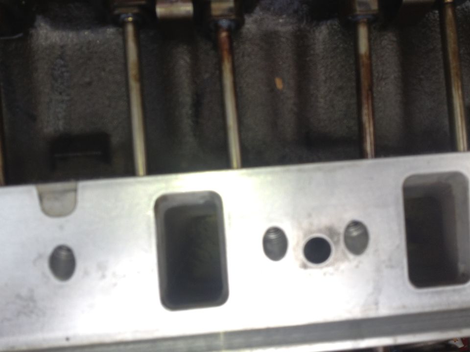 Close-up of engine cylinder head ports and pushrods