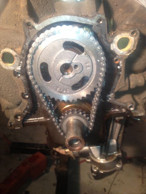 1992 Ford Bronco - Engine timing chain and gears assembly, likely during a rebuild or maintenance.