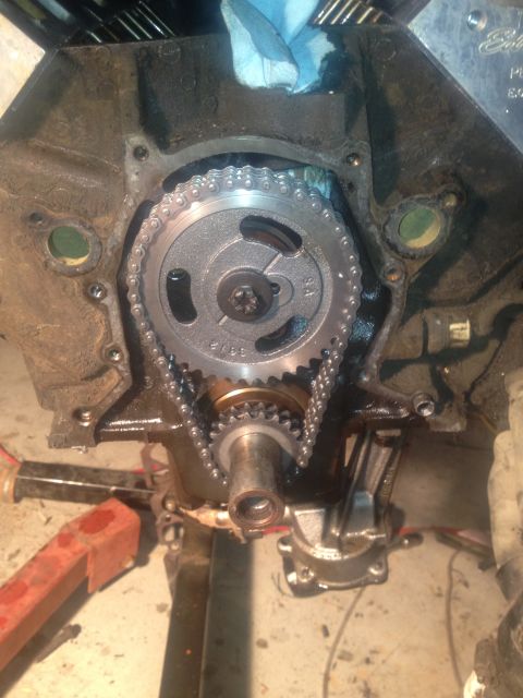 1992 Ford Bronco - Close-up of an engine's timing chain and gears, likely during a rebuild or repair process.