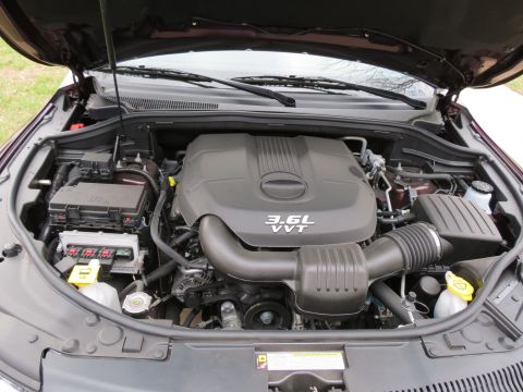 2012 Dodge Durango - The engine bay of a vehicle, the 3.6L VVT engine and associated components.