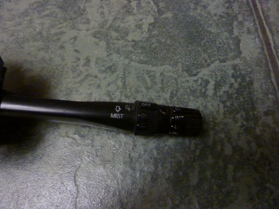 Black wiper stalk with 'MIST' and speed settings (OFF, INT, L, M, H)