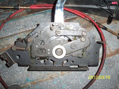 1968 Ford Ranchero - Close-up of a complex mechanical assembly, likely a vehicle's shifter mechanism.