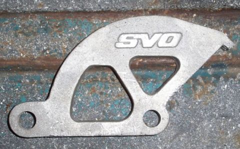 1968 Ford Ranchero - A metal part with 'SVO' stamped on it is shown against a weathered background.