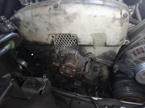 1993 Ford Taurus - Engine components including water pump and alternator are visible in this close-up view.