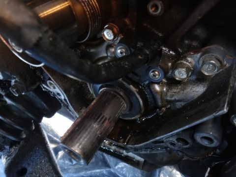 1993 Ford Taurus - Engine component with a sensor and splined shaft visible.