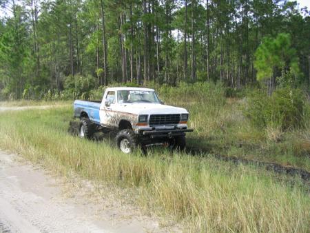 1991 Ford Bronco - Jims Truck, on 39.5s and has a PTO winch that is huge.