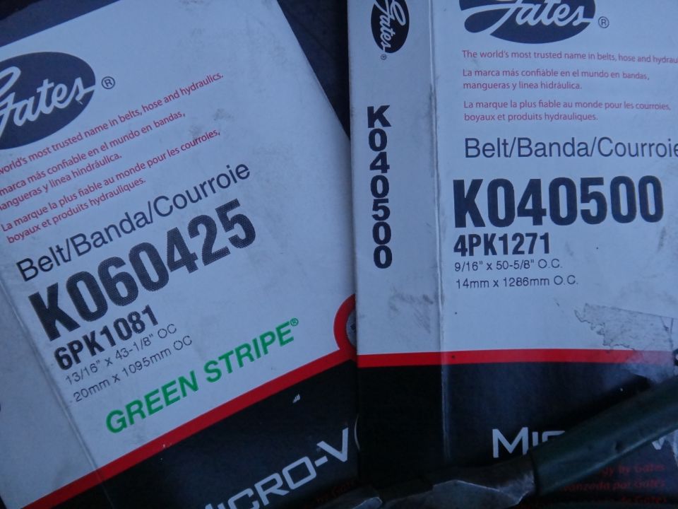 Two Gates belt boxes, one labeled K060425, the other K040500