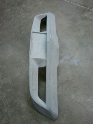 1976 Chevrolet Corvette - A gray car bumper part is shown against a concrete floor, with a SuperMotors watermark at the bottom.