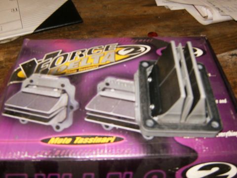 2000 Ford E350 - Motorcycle reed valve assembly with 'Force Delta 2' and 'Moto Tassinari' branding on the box.