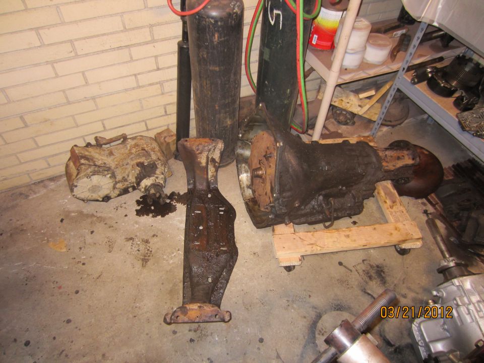 Transmission and transfer case parts on floor