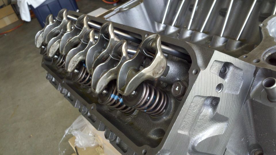 Engine valve train with rocker arms and springs, close-up view
