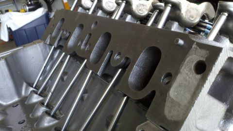 1978 Ford Bronco - Close-up view of an engine block and cylinder head assembly, showing internal components.