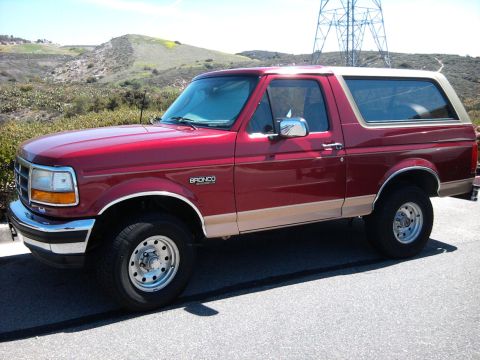 1994 Ford Bronco - This 1994 Ford Bronco is shown in a three-quarter front view, highlighting its two-tone paint scheme.