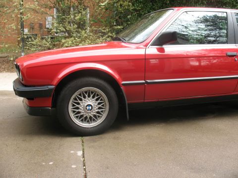 1986 BMW 3 Series - Front quarter view of a red 1986 BMW 3 Series.