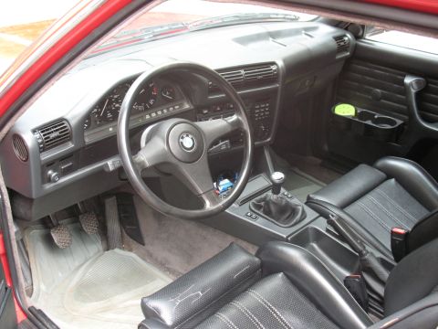 1986 BMW 3 Series - Interior view of a 1986 BMW 3 Series, showing the dashboard, steering wheel, and seats.