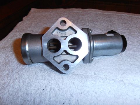 1990 Ford Bronco - This is a close-up of an idle air control valve, a component used in vehicle engines.