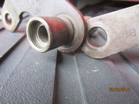 1979 Ford Bronco - Metal bracket with threaded hole, possibly a transmission part.