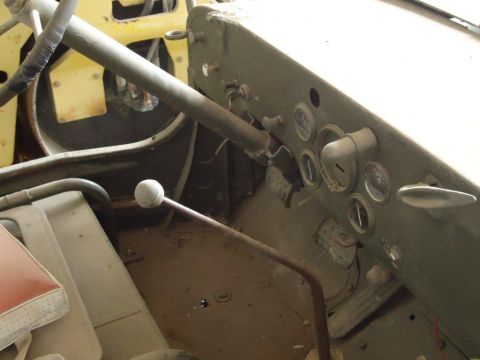 1986 Ford Bronco - Interior view of a Jeep CJ, highlighting the dashboard and shifter mechanism.