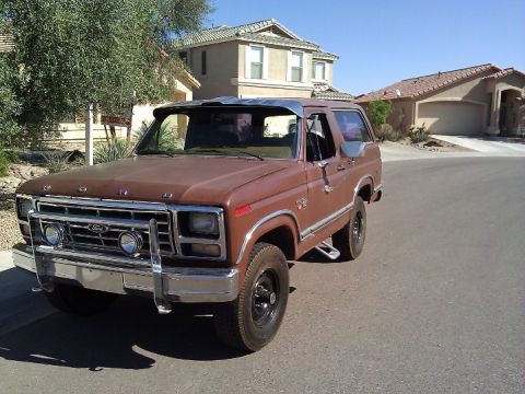 1981 Ford Bronco - This 1981 Ford Bronco is seen from a three-quarter front view, a chrome grille guard and a visor.