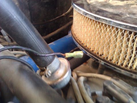 1981 Ford Bronco - Engine bay detail with air filter and various hoses visible.