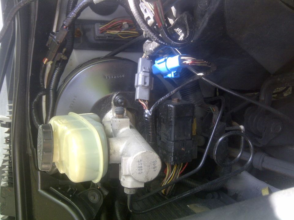 Brake master cylinder and wiring harness with blue connector