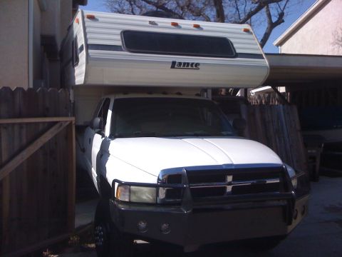1997 Dodge 3500 - This 1997 Dodge 3500 pickup truck is equipped with a Lance camper shell.