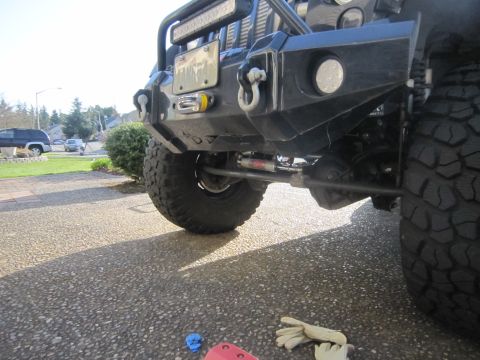 2008 Jeep Wrangler - Close-up view of the front bumper and suspension system on a Jeep Wrangler.