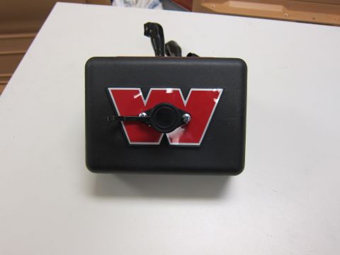 1987 Dodge 1500 - A black box with a prominent red and white W logo is shown from the front.