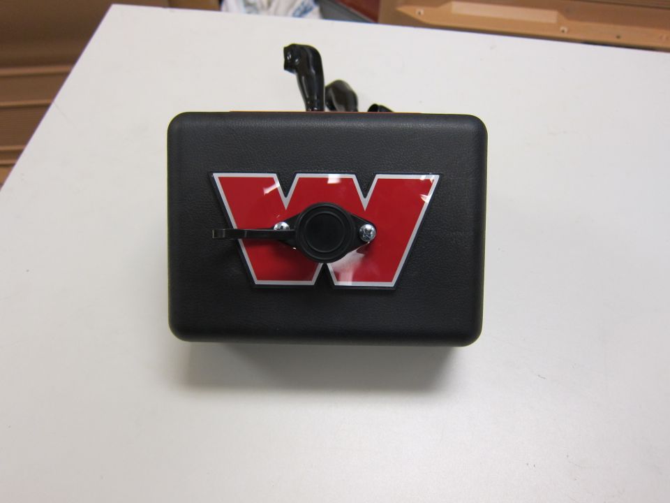 Black box with a red and white W logo and a black lever