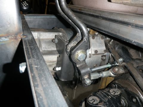 1961 International Scout 800 - Detail of a transfer case and shifter linkage assembly, likely part of a custom build.
