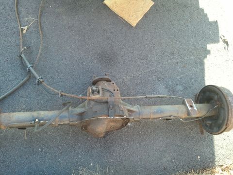 1991 Ford Bronco - Rear axle assembly with drum brake, likely from an older truck or SUV.