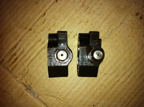 1998 Ford Crown Victoria - Two timing arms, likely for engine repair, are shown against a textured background.
